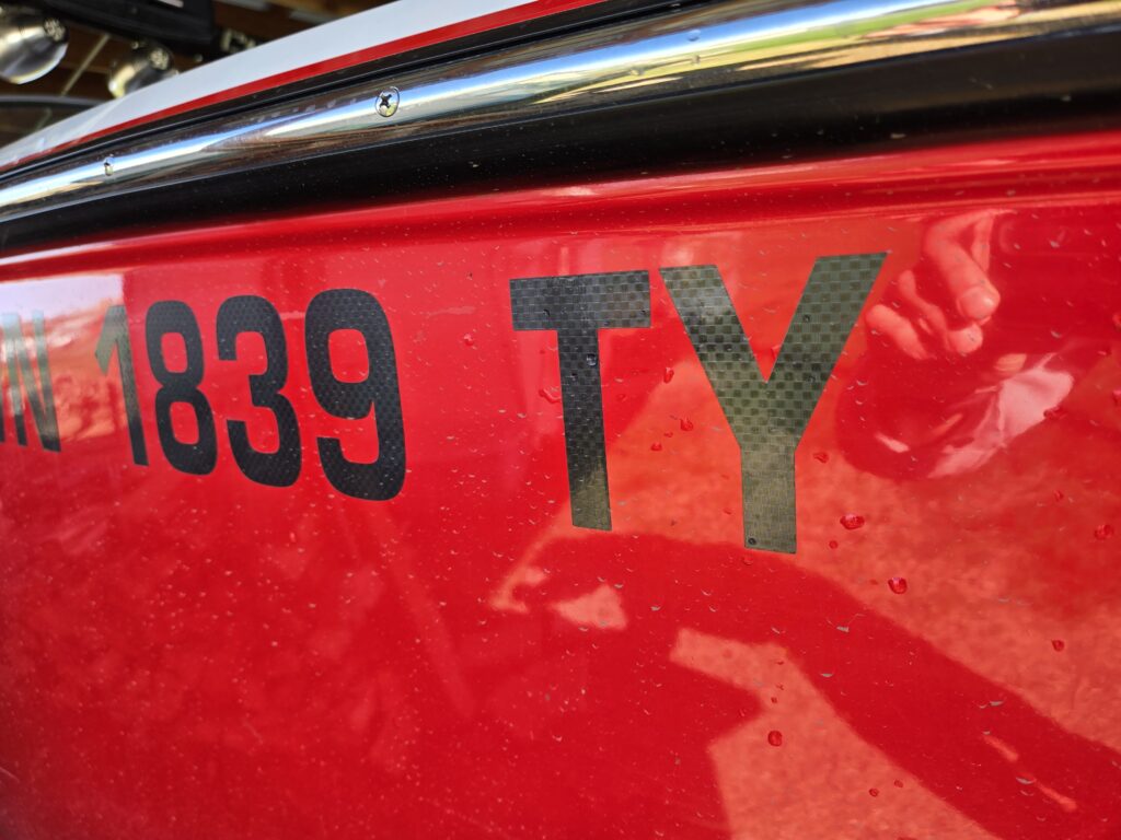 Dark carbon fiber boat registration stickers