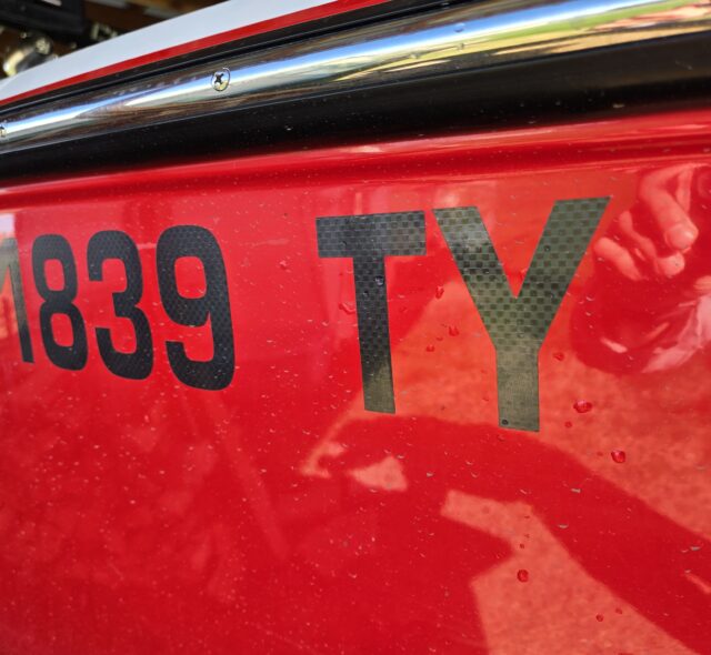 Dark carbon fiber boat registration stickers